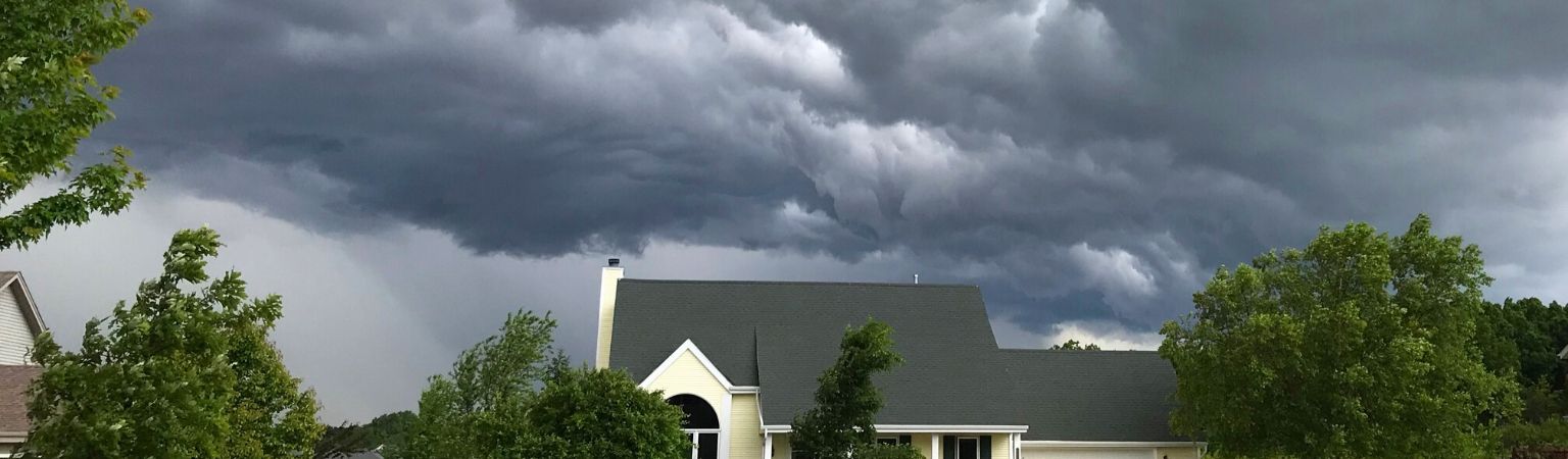 Storm in the sky above a house