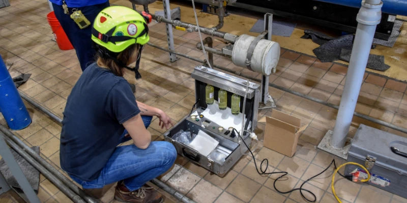 worker monitoring water levels