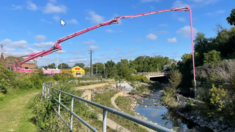 crane cleaning the kinnickinnic river in milwaukee