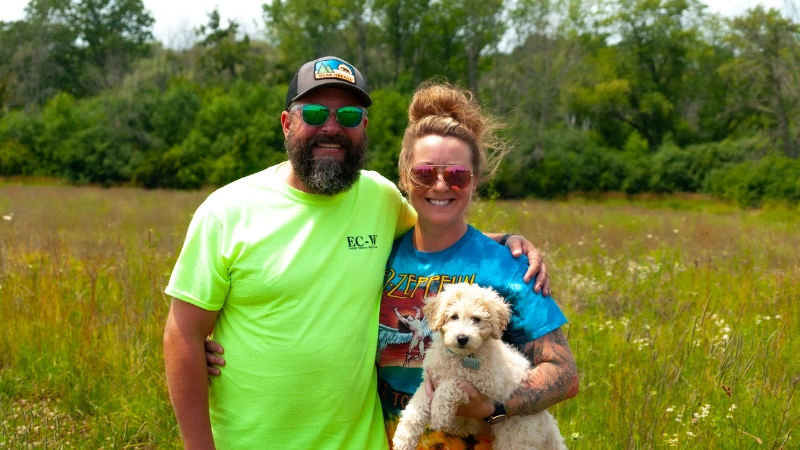 family standing on farm land
