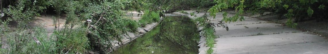 concrete lined kinnickinnic river in Jackson Park