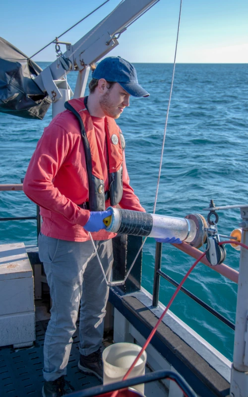 MMSD Freshwater Monitoring team taking a sample