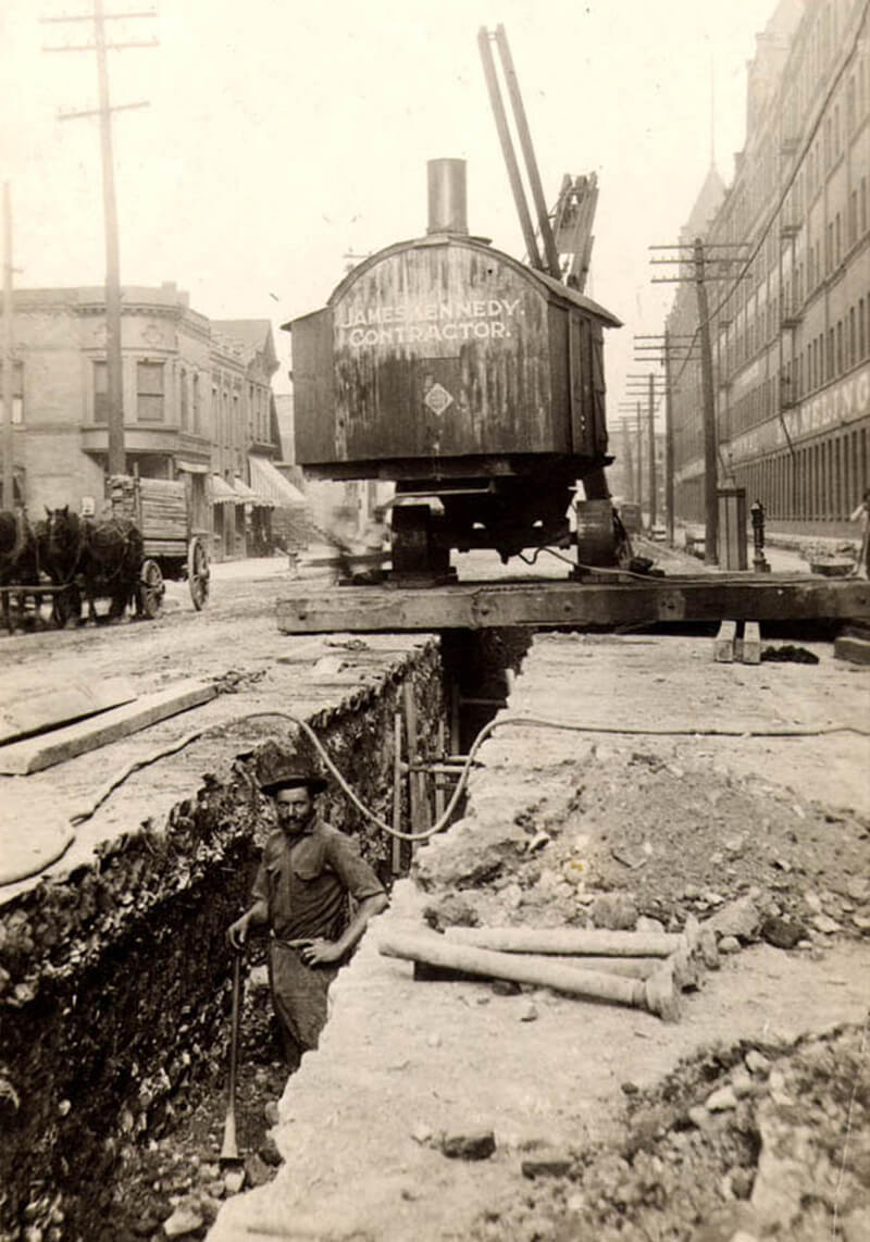 man doing sewer construction 