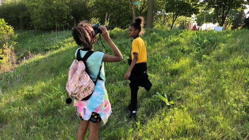 children exploring outdoor classroom