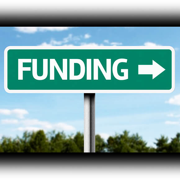 sign showing an arrow pointing right for "funding"