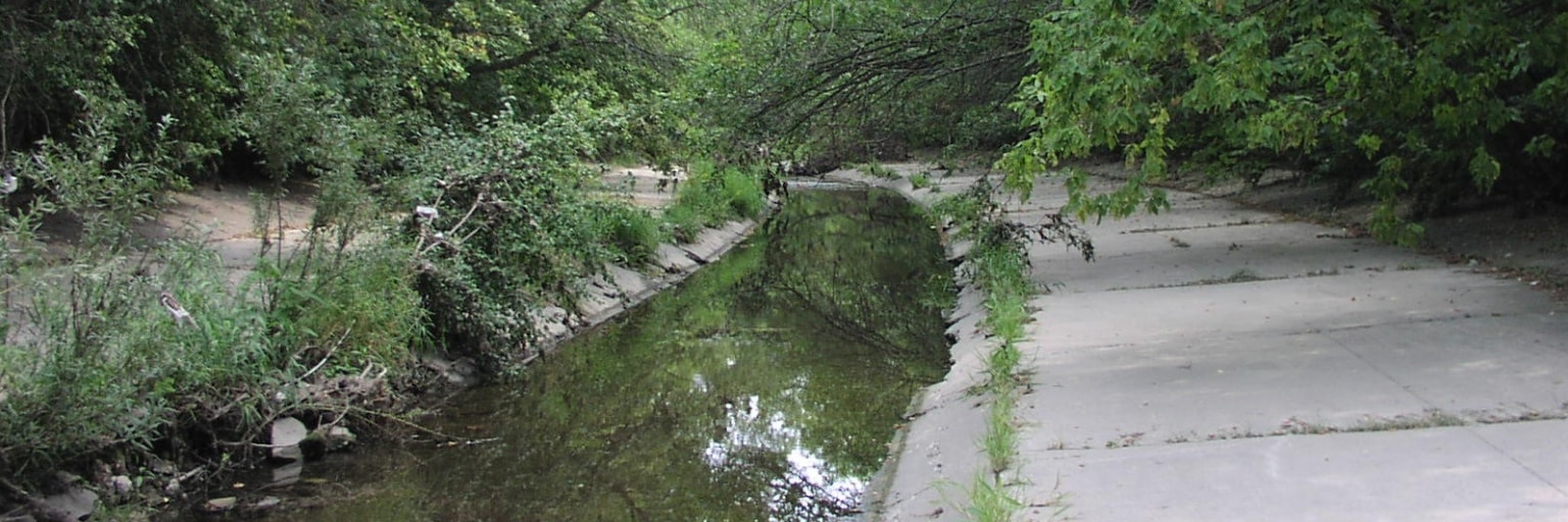 concrete lined kinnickinnic river in Jackson Park