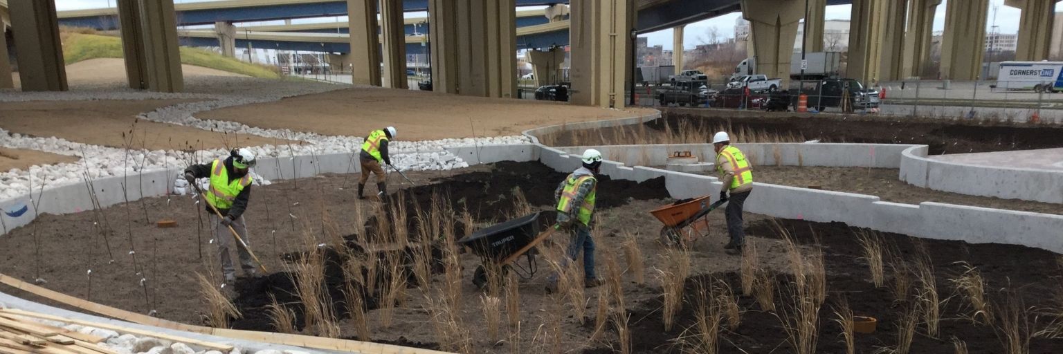 construction crew working under underpass