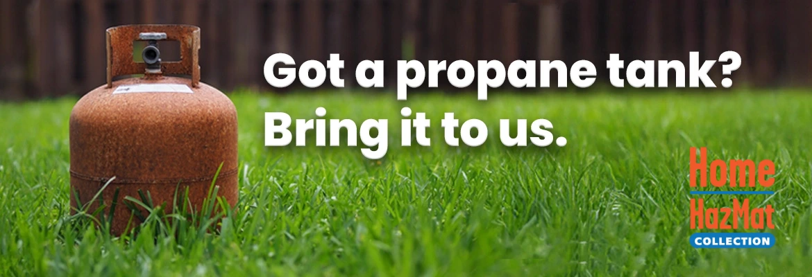 an old propane tank in the grass