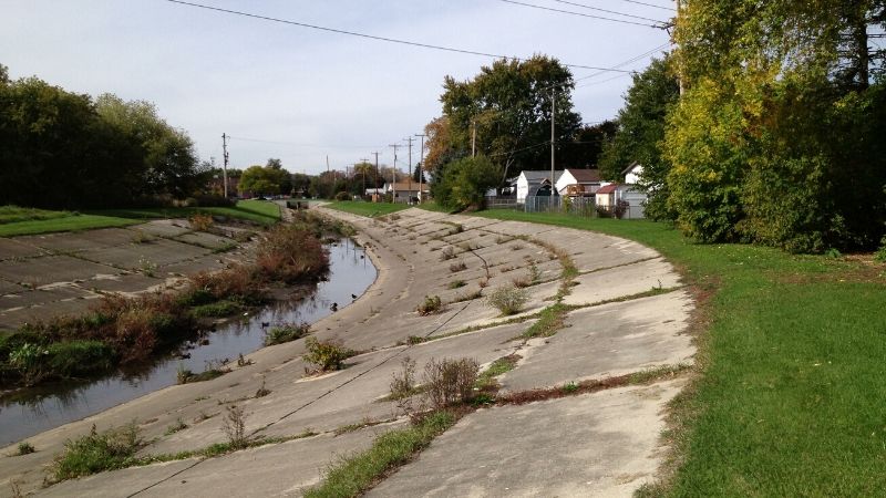 concrete lined kinnickinnic river in wilson park creek