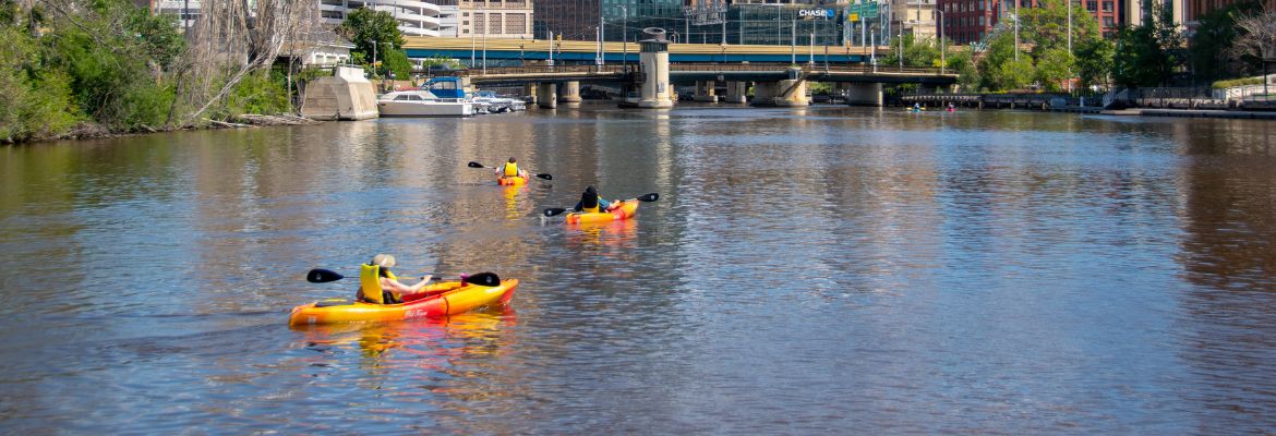 kayakers on milwaukee river downtown milwaukee
